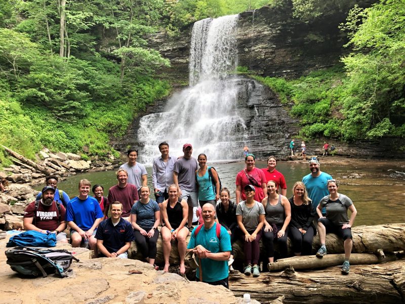 Attendees of the 2nd Annual Accounting Research Conference enjoy a hike to Cascade Falls after the conference.